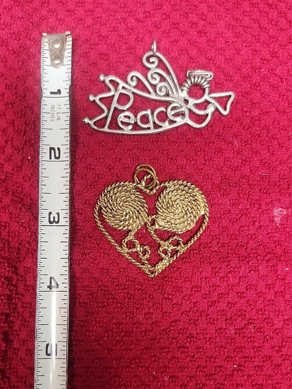 2 beautiful gold and silver artsy Pendants